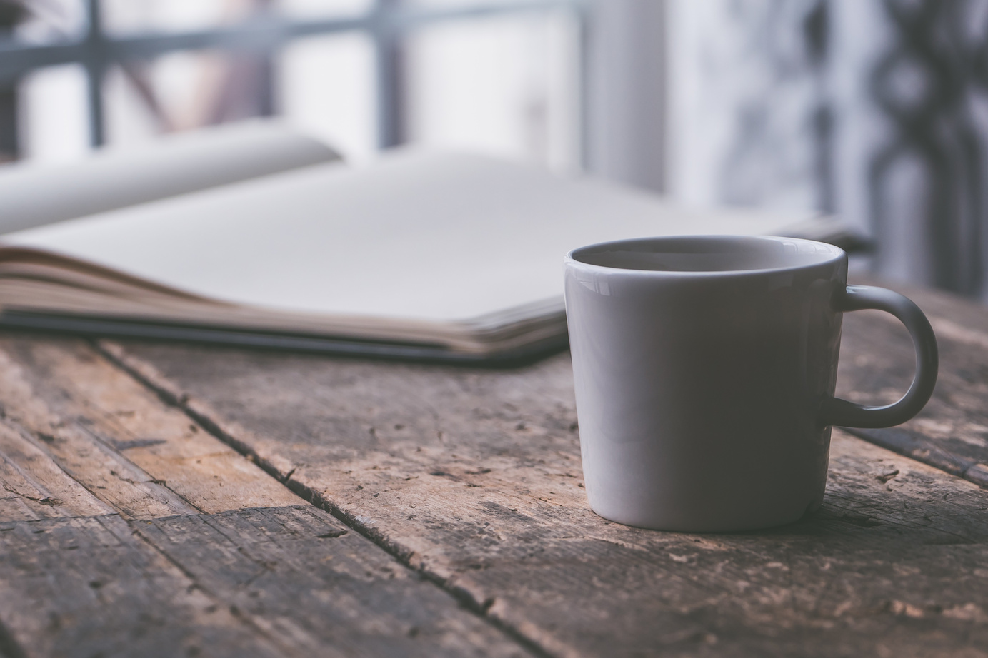 Notebook and Coffee Cup